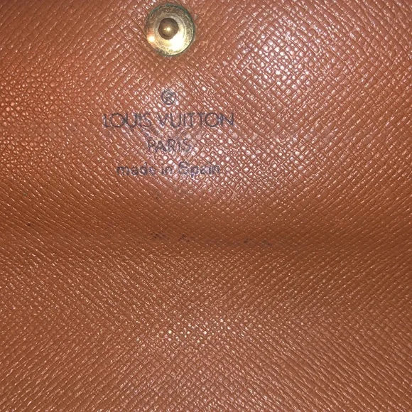 Authentic Louis Vuitton monogram wallet 7.25inLx4inW
